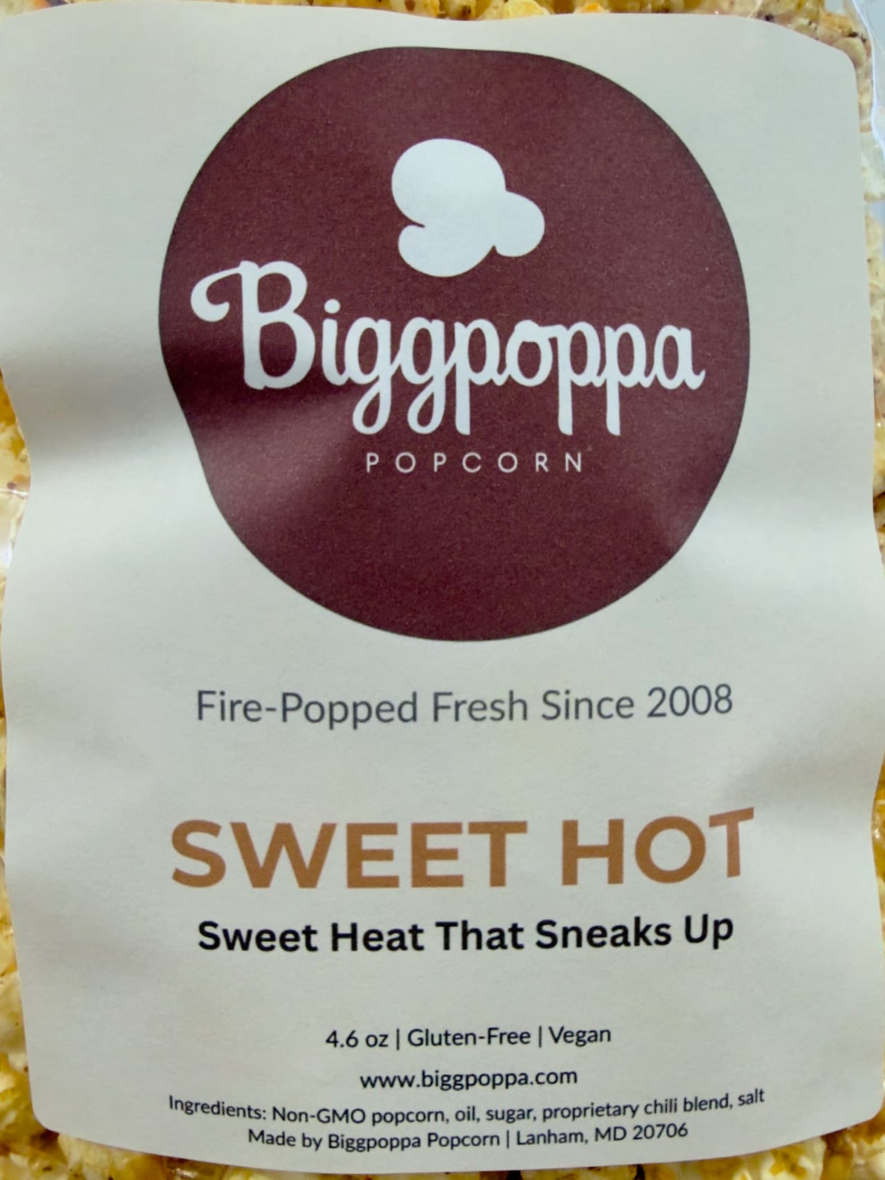 Sweet Hot packaging with Biggpoppa Popcorn branding and product details.