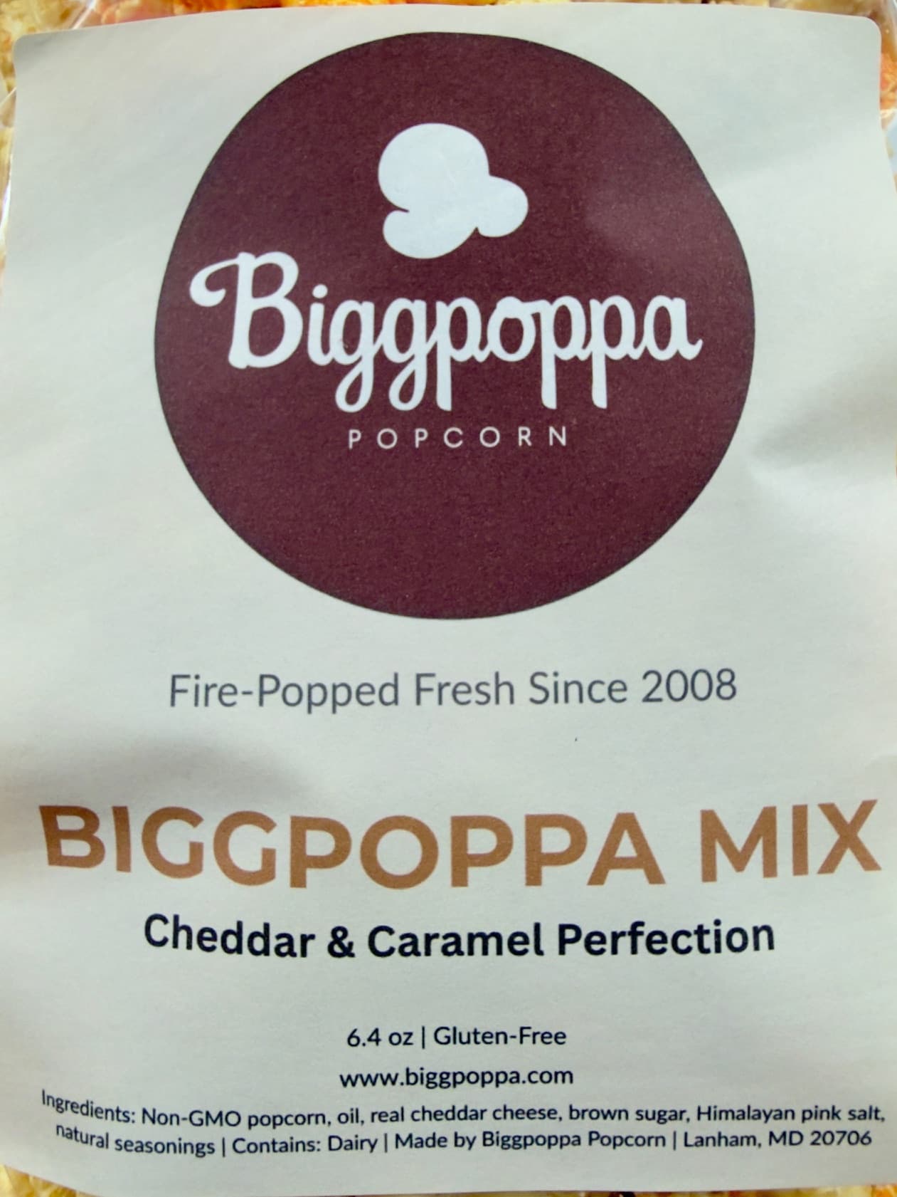 Biggpoppa Mix packaging with Biggpoppa Popcorn branding and product details.